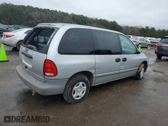2000 Dodge Caravan with VIN 2B4GP25R3YR545993, listed as a Copart auction lot 76538464 with 63,127 mi miles and Salvage title. Bid and sale history available at DreamBid. Image 3.