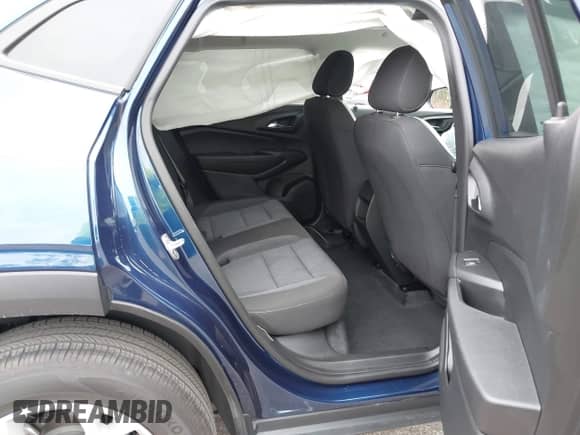 2024 Chevrolet Trax LS with VIN KL77LFE21RC136231, listed as a IAAI auction lot 43346959 with 9,395 mi miles and . Bid and sale history available at DreamBid. Image 8.