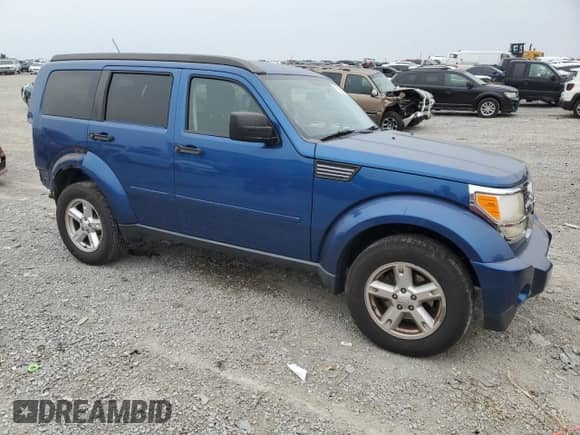 2009 Dodge Nitro SE с VIN 1D8GT28KX9W533248, выставлен на аукционе Copart как лот 70500994 с пробегом 124 091 миль миль и Списание • Salvage title. История ставок и продаж доступна на DreamBid. Изображение 4.