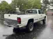 1999 Dodge 2500 with VIN 1B7KF2364XJ585723, listed as a Copart auction lot 69488095 with 272,905 mi miles and Clean title. Bid and sale history available at DreamBid. Image 4.