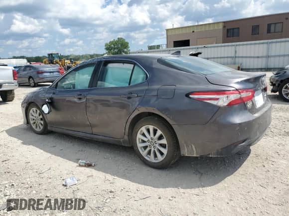 2020 Toyota Camry LE с VIN 4T1C11AK1LU399560, выставлен на аукционе Copart как лот 69238445 с пробегом 160 264 миль миль и Списание • Salvage title. История ставок и продаж доступна на DreamBid. Изображение 2.