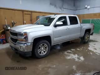 2017 Chevrolet Silverado 1500 LT z VIN 3GCUKREC2HG123230, wystawiony jako Copart lot #64176915 z przebiegiem 215 675 mil mil oraz Czysty tytuł • Clean title. Historia ofert i sprzedaży dostępna na DreamBid. Obrazek 1.