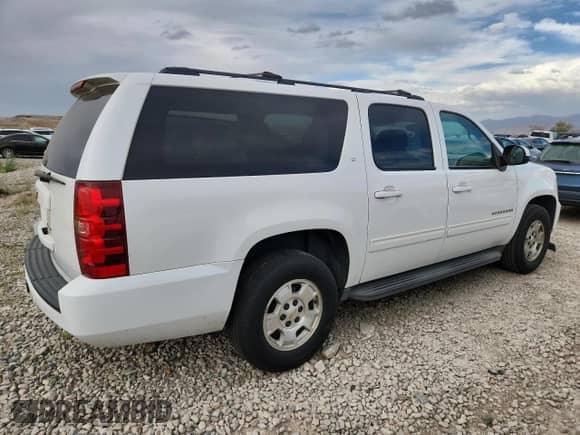 2013 Chevrolet Suburban LT с VIN 1GNSCJE07DR356534, выставлен на аукционе Copart как лот 80011485 с пробегом 298 489 миль миль и Чистый • Clean title. История ставок и продаж доступна на DreamBid. Изображение 3.