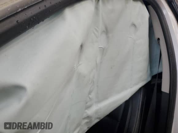 2019 Chevrolet Traverse Premier с VIN 1GNEVKKW4KJ140609, выставлен на аукционе Copart как лот 69308225 с пробегом Не указан миль и Списание • Salvage title. История ставок и продаж доступна на DreamBid. Изображение 10.