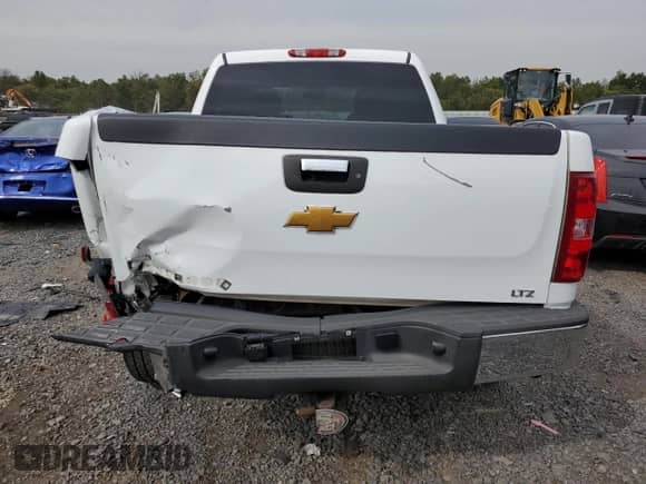 2012 Chevrolet Silverado 1500 LTZ with VIN 1GCPKTE71CF124456, listed as a Copart auction lot 83750495 with 158,377 mi miles and Salvage title. Bid and sale history available at DreamBid. Image 6.