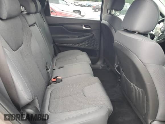 2019 Hyundai Santa Fe SE с VIN 5NMS23AD5KH035559, выставлен на аукционе Copart как лот 69690105 с пробегом Не указан миль и Списание • Salvage title. История ставок и продаж доступна на DreamBid. Изображение 10.