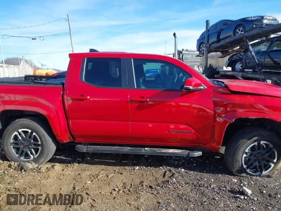 2024 Toyota Tacoma SR5 with VIN 3TYLB5JN1RT001686, listed as a IAAI auction lot 41071582 with 5,986 mi miles and . Bid and sale history available at DreamBid. Image 14.