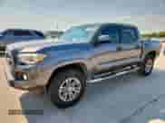 2016 Toyota Tacoma TRD Off Road с VIN 3TMAZ5CN8GM006585, выставлен на аукционе Copart как лот 70260245 с пробегом 94 079 миль миль и Списание • Salvage title. История ставок и продаж доступна на DreamBid. Изображение 1.