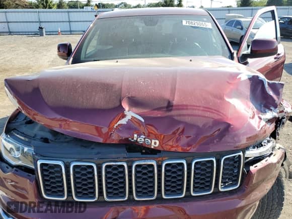 2020 Jeep Grand Cherokee Laredo E with VIN 1C4RJFAG7LC398457, listed as a Copart auction lot 70829065 with 52,734 mi miles and Salvage title. Bid and sale history available at DreamBid. Image 12.