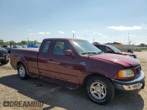 1997 Ford F-150 XL z VIN 1FTEX17L4VKC42857, wystawiony jako Copart lot #68759105 z przebiegiem 96 657 mil mil oraz Szkoda całkowita • Salvage title. Historia ofert i sprzedaży dostępna na DreamBid. Obrazek 4.
