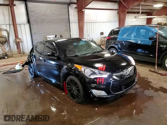 2012 Hyundai Veloster w/Gray Int z VIN KMHTC6AD3CU052773, wystawiony jako Copart lot #70096015 z przebiegiem 154 233 mil mil oraz Czysty tytuł • Clean title. Historia ofert i sprzedaży dostępna na DreamBid. Obrazek 13.