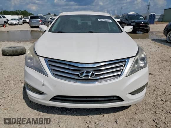 2013 Hyundai Azera с VIN KMHFG4JG0DA288770, выставлен на аукционе Copart как лот 80545695 с пробегом 162 977 миль миль и Чистый • Clean title. История ставок и продаж доступна на DreamBid. Изображение 5.