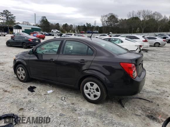 2013 Chevrolet Sonic LS с VIN 1G1JA5SG7D4241036, выставлен на аукционе Copart как лот 54960174 с пробегом 132 465 миль миль и Списание • Salvage title. История ставок и продаж доступна на DreamBid. Изображение 2.