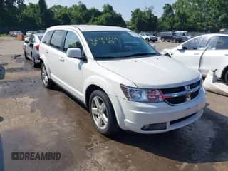 2009 Dodge Journey SXT with VIN 3D4GH57V29T604111, listed as a IAAI auction lot 42787266 with 125,758 mi miles and . Bid and sale history available at DreamBid. Image 1.