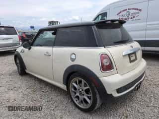2009 MINI Hardtop S with VIN WMWMF73569TW87347, listed as a Copart auction lot 59445035 with 118,336 mi miles and Salvage title. Bid and sale history available at DreamBid. Image 2.