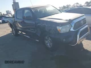 2013 Toyota Tacoma PreRunner z VIN 5TFJX4GN0DX018780, wystawiony jako IAAI lot #41342627 z przebiegiem 111 195 mil mil oraz . Historia ofert i sprzedaży dostępna na DreamBid. Obrazek 1.