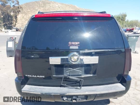 2007 Cadillac Escalade z VIN 1GYEC63887R281627, wystawiony jako IAAI lot #42312945 z przebiegiem Nie podano mil oraz . Historia ofert i sprzedaży dostępna na DreamBid. Obrazek 16.