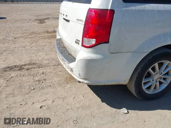 2014 Dodge Grand Caravan SXT with VIN 2C4RDGCG4ER356980, listed as a IAAI auction lot 43422340 with 220,103 mi miles and . Bid and sale history available at DreamBid. Image 6.