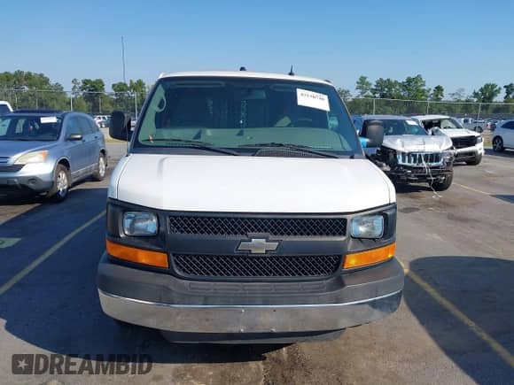 2014 Chevrolet Express Cargo z VIN 1GCWGFCB6E1131070, wystawiony jako IAAI lot #43150748 z przebiegiem 73 635 mil mil oraz . Historia ofert i sprzedaży dostępna na DreamBid. Obrazek 12.