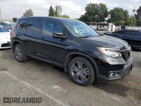 2020 Honda Passport EX-L with VIN 5FNYF7H57LB002571, listed as a Copart auction lot 53063375 with 56,866 mi miles and Salvage title. Bid and sale history available at DreamBid. Image 4.