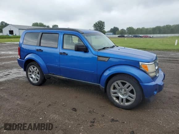 2007 Dodge Nitro SLT with VIN 1D8GU58K17W681431, listed as a Copart auction lot 67245855 with 214,389 mi miles and Clean title. Bid and sale history available at DreamBid. Image 4.