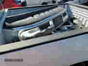 2023 Ram 1500 Tradesman z VIN 1C6RR7FTXPS588759, wystawiony jako Copart lot #71082284 z przebiegiem 31 945 mil mil oraz Szkoda całkowita • Salvage title. Historia ofert i sprzedaży dostępna na DreamBid. Obrazek 12.