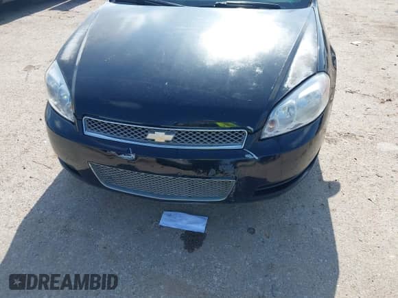 2013 Chevrolet Impala LS with VIN 2G1WA5E3XD1120124, listed as a IAAI auction lot 42360600 with 77,081 mi miles and . Bid and sale history available at DreamBid. Image 6.