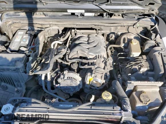 2013 Jeep Wrangler Sport with VIN 1C4AJWAG1DL558282, listed as a Copart auction lot 86517235 with 152,933 mi miles and Salvage title. Bid and sale history available at DreamBid. Image 12.