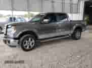 2013 Ford F-150 Lariat with VIN 1FTFW1ET2DFC87796, listed as a Copart auction lot 71112565 with 207,394 mi miles and Salvage title. Bid and sale history available at DreamBid. Image 1.