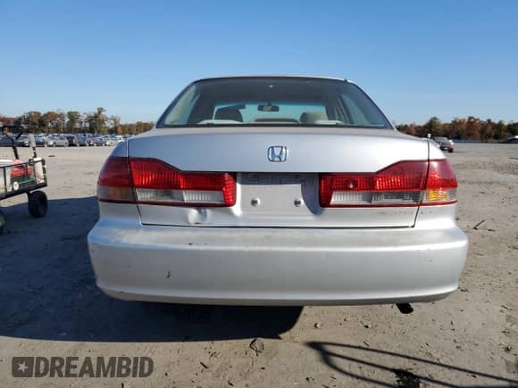2002 Honda Accord LX with VIN 1HGCG56462A019991, listed as a Copart auction lot 90265405 with 176,773 mi miles and Clean title. Bid and sale history available at DreamBid. Image 6.