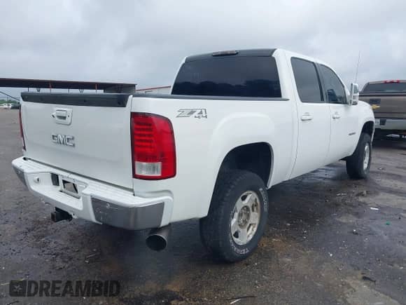 2010 GMC Sierra 1500 SLT with VIN 3GTRKWE37AG184132, listed as a IAAI auction lot 42106936 with 243,711 mi miles and . Bid and sale history available at DreamBid. Image 4.