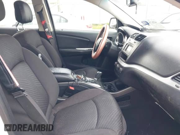 2014 Dodge Journey SE z VIN 3C4PDCAB8ET148539, wystawiony jako IAAI lot #42674214 z przebiegiem 172 272 mil mil oraz . Historia ofert i sprzedaży dostępna na DreamBid. Obrazek 5.