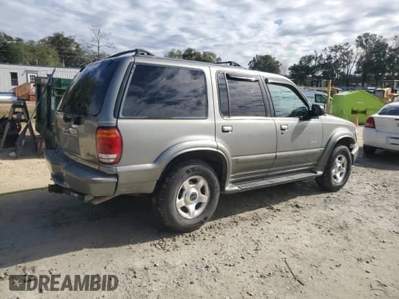 2000 Ford Explorer Limited with VIN 1FMDU75E9YUB50157, listed as a Copart auction lot 88743875 with 184,376 mi miles and Salvage title. Bid and sale history available at DreamBid. Image 3.