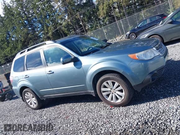 2012 Subaru Forester X Premium z VIN JF2SHADC2CH415856, wystawiony jako IAAI lot #43348750 z przebiegiem 131 478 mil mil oraz . Historia ofert i sprzedaży dostępna na DreamBid. Obrazek 13.