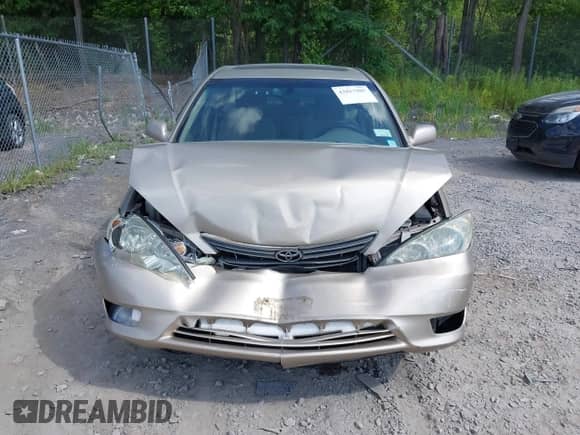2005 Toyota Camry LE with VIN 4T1BE30K35U639188, listed as a IAAI auction lot 42827905 with 143,790 mi miles and . Bid and sale history available at DreamBid. Image 12.