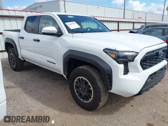 2025 Toyota Tacoma SR with VIN 3TMLB5JN8SM105447, listed as a IAAI auction lot 43487043 with 13,994 mi miles and . Bid and sale history available at DreamBid. Image 1.
