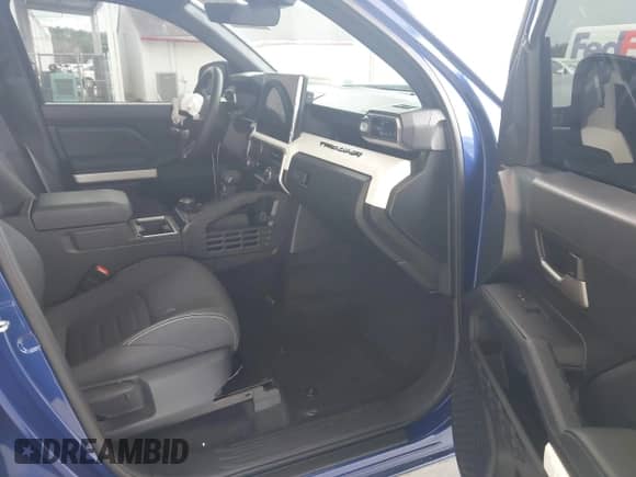 2024 Toyota Tacoma SR5 with VIN 3TYLB5JN9RT057195, listed as a IAAI auction lot 42628891 with 15,824 mi miles and . Bid and sale history available at DreamBid. Image 5.