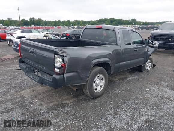 2023 Toyota Tacoma SR with VIN 3TYSX5EN6PT021792, listed as a IAAI auction lot 43037546 with 20,673 mi miles and . Bid and sale history available at DreamBid. Image 4.