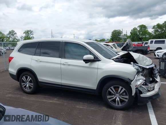 2017 Honda Pilot EX-L with VIN 5FNYF5H50HB002326, listed as a IAAI auction lot 42356845 with 101,098 mi miles and . Bid and sale history available at DreamBid. Image 13.