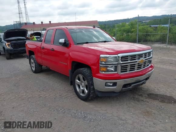 2014 Chevrolet Silverado 1500 LT with VIN 1GCVKREC4EZ116490, listed as a IAAI auction lot 42600404 with 199,461 mi miles and . Bid and sale history available at DreamBid. Image 1.