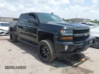 2017 Chevrolet Silverado 1500 LT with VIN 3GCPCREC1HG389851, listed as a IAAI auction lot 42673822 with 139,804 mi miles and . Bid and sale history available at DreamBid. Image 1.