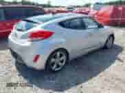 2012 Hyundai Veloster w/Red Int z VIN KMHTC6AD2CU061478, wystawiony jako IAAI lot #43104434 z przebiegiem 216 113 mil mil oraz . Historia ofert i sprzedaży dostępna na DreamBid. Obrazek 4.