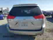 2014 Toyota Sienna LE AAS with VIN 5TDKK3DC0ES512595, listed as a Copart auction lot 81074235 with 148,467 mi miles and Salvage title. Bid and sale history available at DreamBid. Image 6.