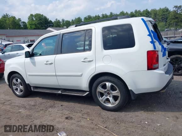 2013 Honda Pilot EX-L with VIN 5FNYF4H63DB077552, listed as a IAAI auction lot 42483801 with 218,823 mi miles and . Bid and sale history available at DreamBid. Image 14.