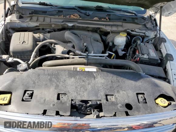 2019 Ram 1500 Big Horn z VIN 1C6RR6LT9KS572754, wystawiony jako Copart lot #61597355 z przebiegiem 105 066 mil mil oraz Szkoda całkowita • Salvage title. Historia ofert i sprzedaży dostępna na DreamBid. Obrazek 11.