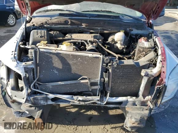 2007 Dodge 1500 SLT z VIN 3D7KR19DX7G751922, wystawiony jako Copart lot #76756934 z przebiegiem 145 115 mil mil oraz Szkoda całkowita • Salvage title. Historia ofert i sprzedaży dostępna na DreamBid. Obrazek 11.