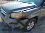 2007 Honda Pilot LX с VIN 2HKYF18197H515127, выставлен на аукционе IAAI как лот 43239641 с пробегом 263 136 миль миль и . История ставок и продаж доступна на DreamBid. Изображение 6.