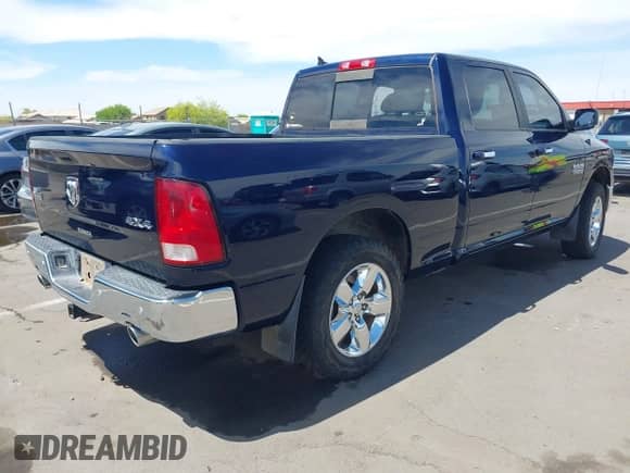 2015 Ram 1500 Big Horn with VIN 1C6RR7TM1FS628805, listed as a IAAI auction lot 42043880 with 79,058 mi miles and . Bid and sale history available at DreamBid. Image 4.