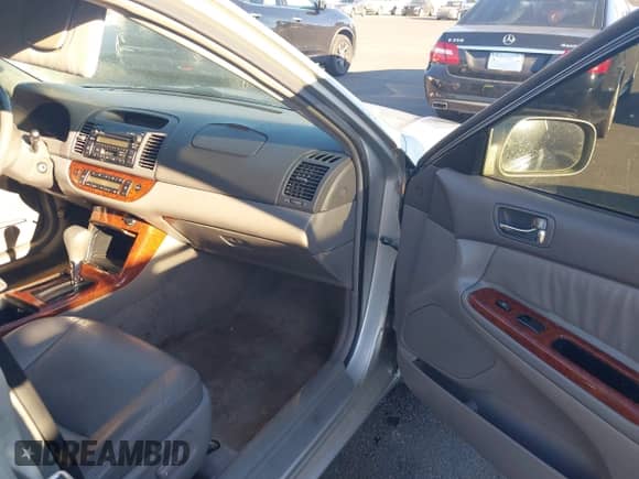 2005 Toyota Camry XLE with VIN 4T1BF30K75U083920, listed as a IAAI auction lot 43497788 with 205,101 mi miles and . Bid and sale history available at DreamBid. Image 5.