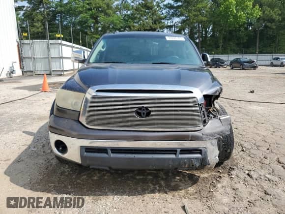 2013 Toyota Tundra z VIN 5TFDM5F10DX041468, wystawiony jako Copart lot #59200165 z przebiegiem 281 387 mil mil oraz Szkoda całkowita • Salvage title. Historia ofert i sprzedaży dostępna na DreamBid. Obrazek 5.